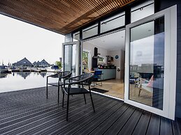 Modern Houseboat With View of the Lake