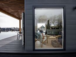 Modern Houseboat With View of the Lake