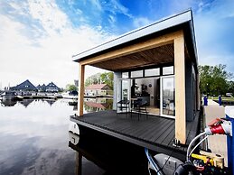 Modern Houseboat With View of the Lake