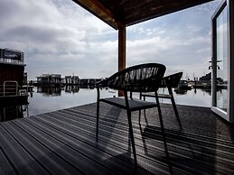 Modern Houseboat With View of the Lake