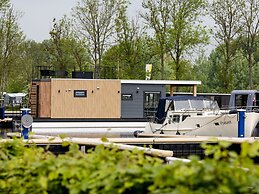 Modern Houseboat With View of the Lake