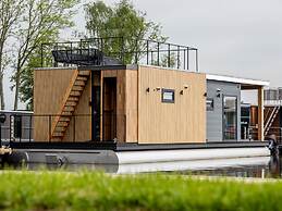 Modern Houseboat With View of the Lake