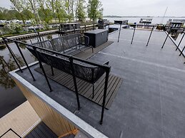 Modern Houseboat With View of the Lake