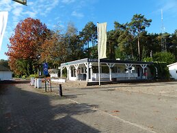 Wooden Holiday Home in Baarle-nassau