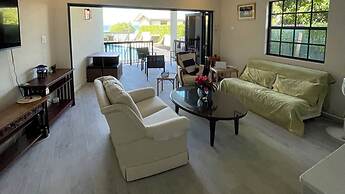 Nestled in the Heart of Fitts Village, Zinnia Becons With the Promise 