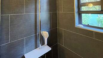 Nestled in the Heart of Fitts Village, Zinnia Becons With the Promise 