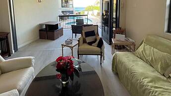 Nestled in the Heart of Fitts Village, Zinnia Becons With the Promise 