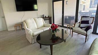 Nestled in the Heart of Fitts Village, Zinnia Becons With the Promise 