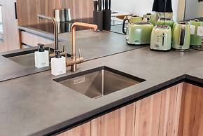 Greenhouse Apartments by Urban Rest