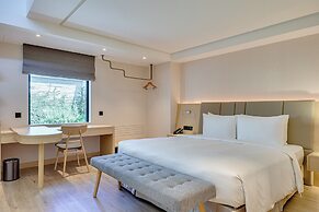 Boutech Wuri Village Hotel