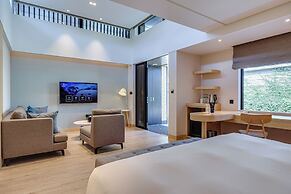 Boutech Wuri Village Hotel