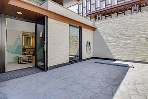 Boutech Wuri Village Hotel