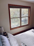 Firefly Lodge! Boardman River! Hot Tub! Woodstove!