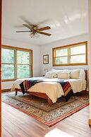 Firefly Lodge! Boardman River! Hot Tub! Woodstove!