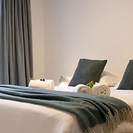 Stylish Duplex Apartment in a Renovated Town House