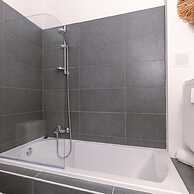 Comfy 1-bedroom Apartment With Side Seaview