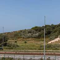 Bright Apartment With Parking Near the Beach