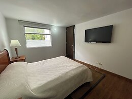 Súper Apartamento TV Wi Fi y parqueadero