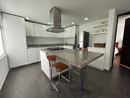 Súper Apartamento TV Wi Fi y parqueadero