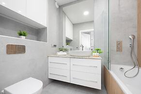 Gumińska Apartment Warsaw by Renters