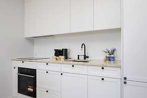 Gumińska Apartment Warsaw by Renters