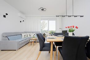 Gumińska Apartment Warsaw by Renters