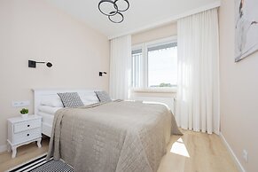 Gumińska Apartment Warsaw by Renters
