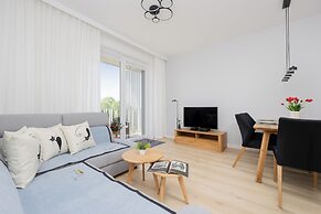 Gumińska Apartment Warsaw by Renters