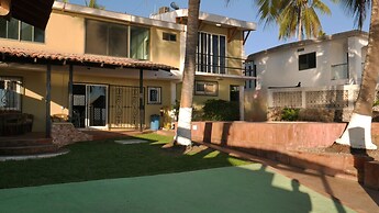 Casa Mister Ken pie de playa Los Cocos