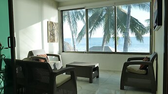 Casa Mister Ken pie de playa Los Cocos