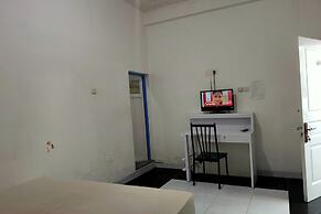 OYO 93152 Azwa Gh Katingan Near Lapangan Sepak Bola Pegatan Hilir