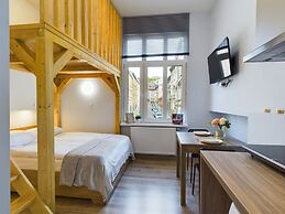 Wooden Cracow Apartment by Renters