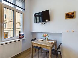 Wooden Cracow Apartment by Renters