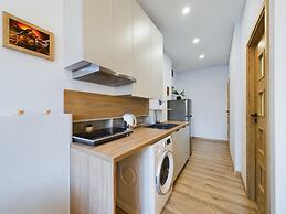 Wooden Cracow Apartment by Renters