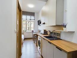 Wooden Cracow Apartment by Renters