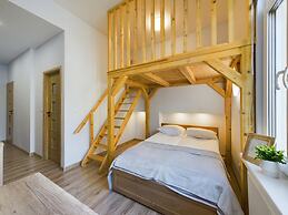Wooden Cracow Apartment by Renters
