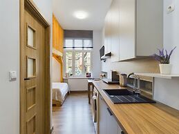 Wooden Cracow Apartment by Renters