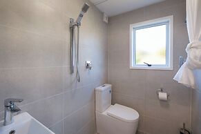 Wharetana Bay Villa with beach walkway