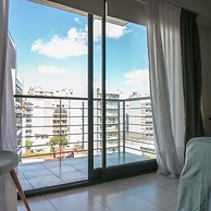 The Feather Comfortable Studio With Balcony