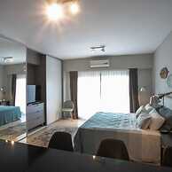 The Feather Comfortable Studio With Balcony