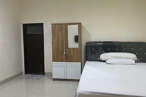 OYO 94015 Kost Alif