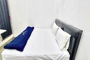 SPOT ON 94048 Kost Pak Dahlan Near Modern Estate