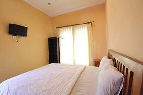 Capital O 94011 Binhari Guest House