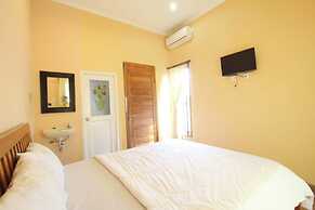 Capital O 94011 Binhari Guest House