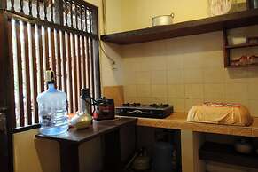 Capital O 94011 Binhari Guest House