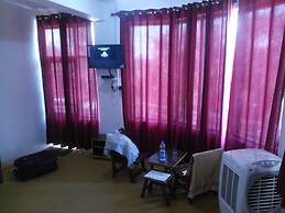 Goroomgo Hotel Aqua Waterfall Dharamsala