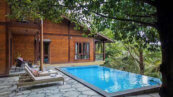 Amã Stays & Trails The Malarbar Villa Iris, Kozhikode