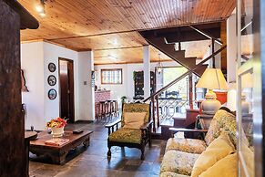 Natureza-piscina-lareira-Brazilan Corner