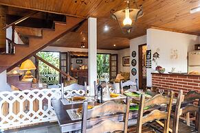 Natureza-piscina-lareira-Brazilan Corner