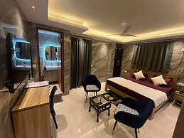 Roomshala 180 Divine Residency